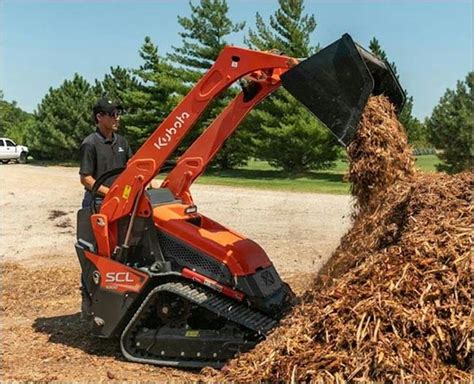 mini stand on skid steer track loader